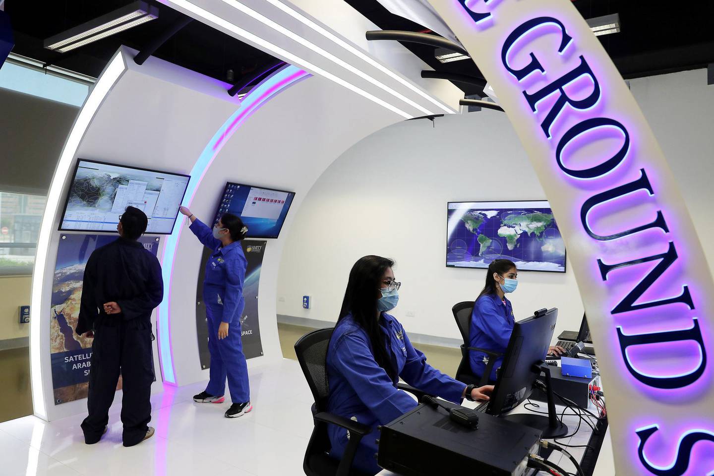 DUBAI, UNITED ARAB EMIRATES , September 21 – 2020 :- Left to Right – Jhoffanel Pazo and Chhavi Jain students of Aerospace Engineering working in the Satellite Ground Station at the Aerospace Lab at the Amity University in Academic City in Dubai.  (Pawan Singh / The National) For News. Story by Sarwat