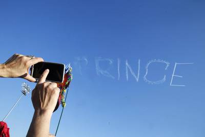 At the New Orleans Jazz and Heritage Festival, “Prince” was written in the sky. Gerald Herbert / AP photo