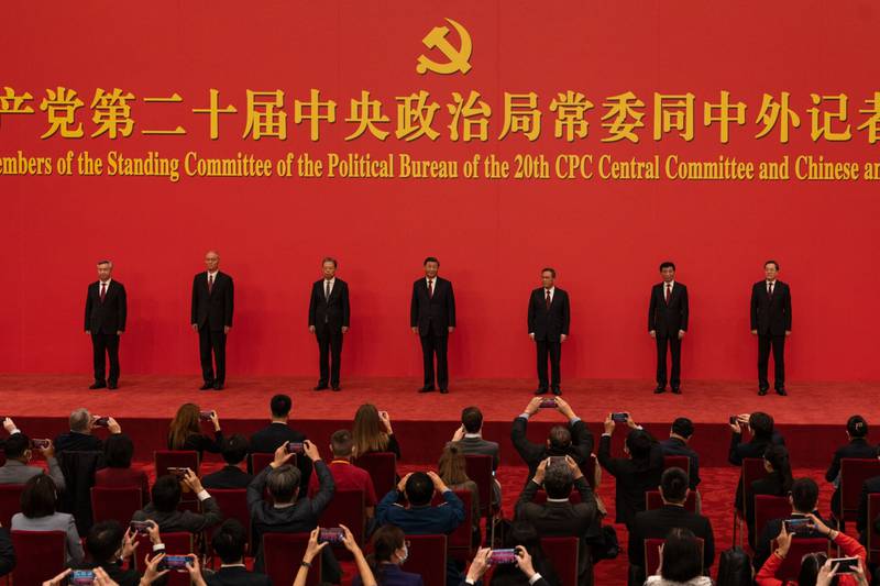 Mr Xi, centre, with the other members of the Communist Party's new Politburo Standing Committee. Bloomberg