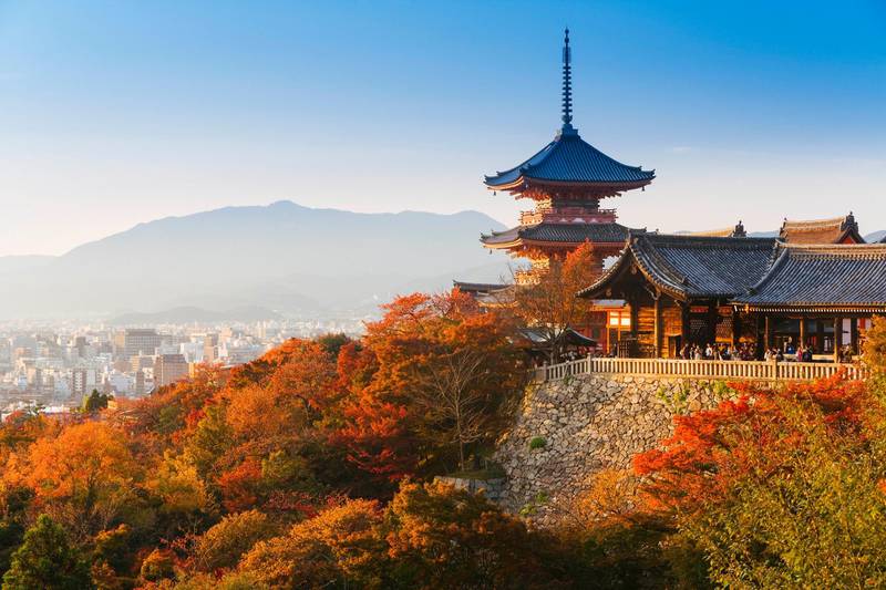 Japan, Honshu, Kansai region, Kiyomizu-Dera, this ancient temple was first built in 798 and the present buildings date from 1633 (view of the temple and city of Kyoto in the background - elevated view). Getty Images