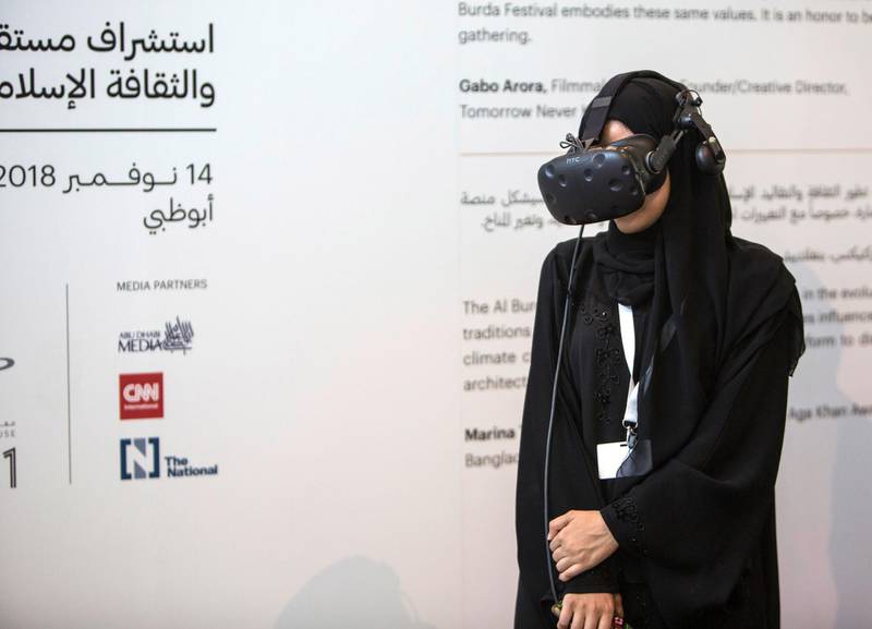 ABU DHABI, UNITED ARAB EMIRATES -Trying out the virtual reality at the Al Burda Festival, Shaping the Future of Islamic Art and Culture at Warehouse 421, Abu Dhabi.  Leslie Pableo for The National for Melissa Gronlund���s story