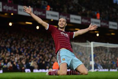 Andy Carroll of West Ham celebrates scoring the first goal against Leicester City at Boleyn Ground on December 20, 2014 in London, England. Jamie McDonald / Getty Images