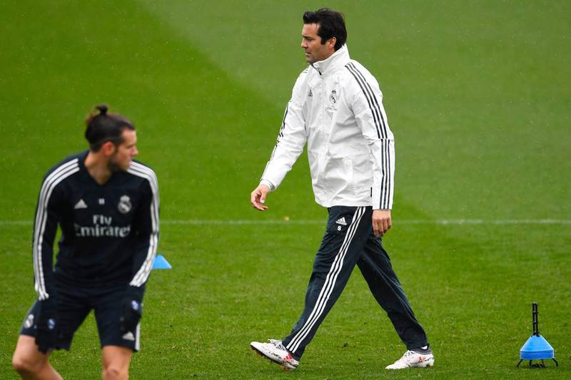 Santiago Solari oversees training with Welsh forward Gareth Bale in the foreground. AFP