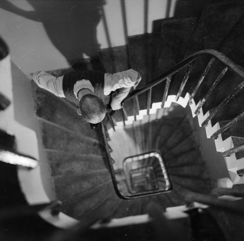 Charles King, the man then responsible for winding and maintaining the great clock of Big Ben, looking down the centre of the tower's staircase in 1957. Getty Images