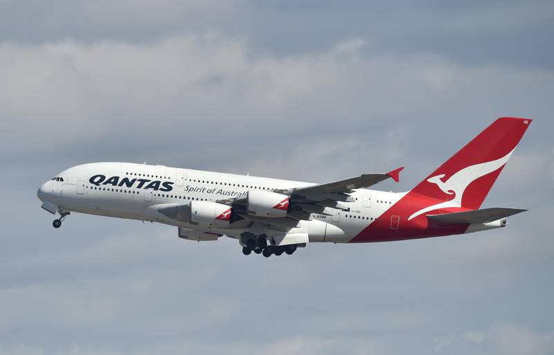 A Qantas Airbus A380 takes off from the airport in Sydney on August 25, 2017. - Australia's Qantas unveiled plans for the world's longest non-stop commercial flight on August 25, 2017 calling it the "last frontier of global aviation", as it posted healthy annual net profits on the back of a strong domestic market. (Photo by PETER PARKS / AFP)