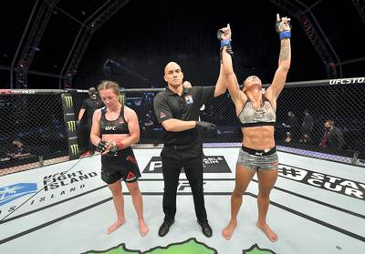 ABU DHABI, UNITED ARAB EMIRATES - JULY 16: Taila Santos of Brazil celebrates after her decision victory over Molly McCann in their flyweight fight during the UFC Fight Night event inside Flash Forum on UFC Fight Island on July 16, 2020 in Yas Island, Abu Dhabi, United Arab Emirates. (Photo by Jeff Bottari/Zuffa LLC via Getty Images)