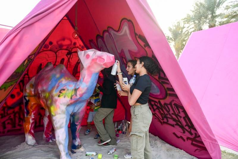 Visitors can paint and draw graffiti on a camel statue 