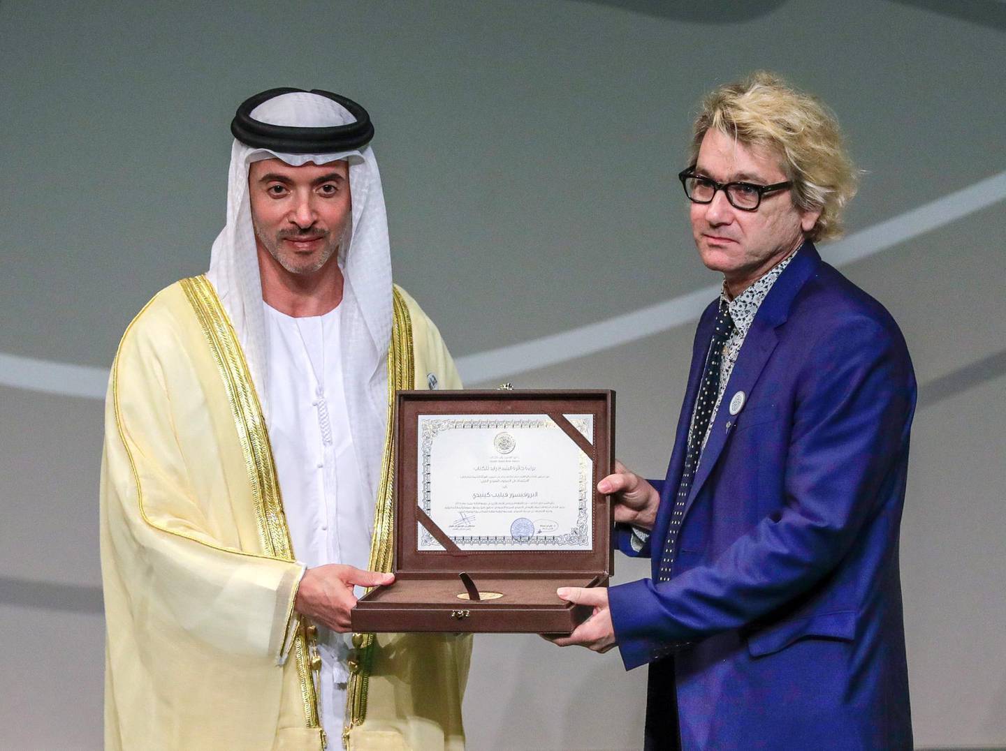 Abu Dhabi, April 25, 2019.  Sheikh Zayed Book Award's 13th Edition (2018-2019).His Highness Sheikh Hazza bin Zayed Al Nahyan, Vice Chairman of the Abu Dhabi Executive Council gives an award to Dr. Philip Kennedy, Arab Culture in other Languages Award, a British academic researher.Victor Besa/The National Section: NAReporter: