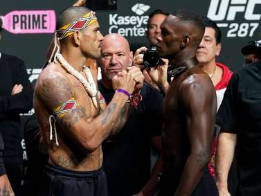UFC middleweight champion Alex Pereira, left, faces challenger Israel Adesanya after the weigh-in for UFC 287. AP