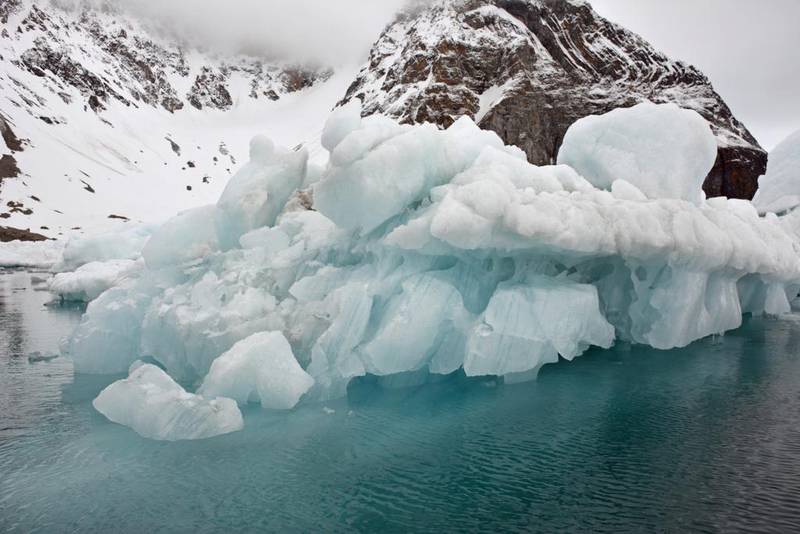 Glacier ice lasts throughout the summer and changes colour due to density. Photo by Rosemary Behan
