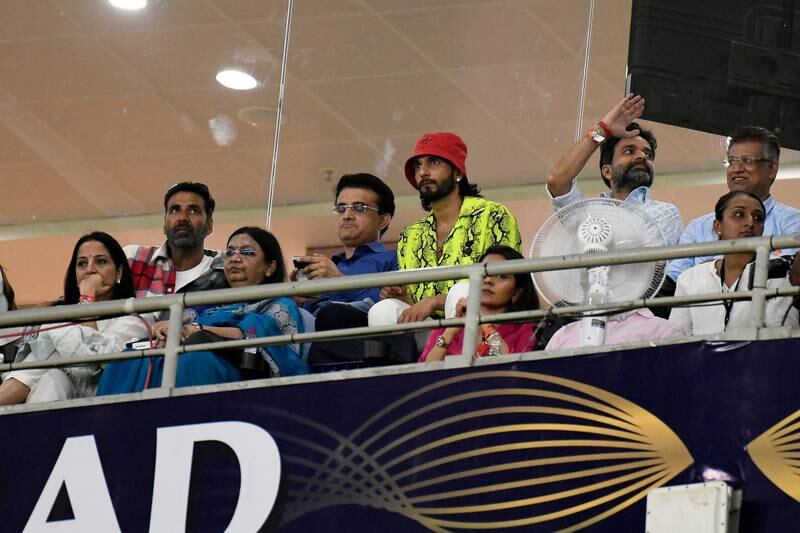 BCCI president Sourav Ganguly, centre, actors Akshay Kumar, left, and Ranveer Singh, red hat, watch the IPL 2022 final at the Narendra Modi Stadium in Ahmedabad. Sportzpics for IPL
