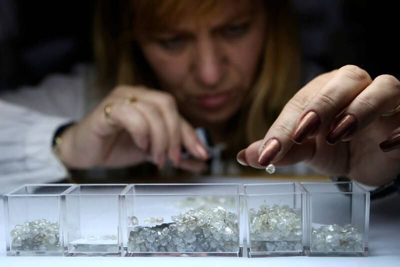 Rough diamonds are sorted at a centre owned by Alrosa in Moscow. Reuters