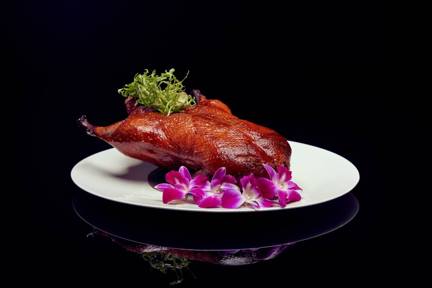 Hakkasan will serve its signature Peking duck on New Year's Eve. Photo: Hakkasan