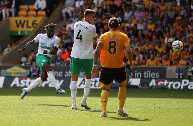 Newcastle attacker Allan Saint-Maximin volleys home to make it 1-1 in the Premier League match at Molineux. Reuters