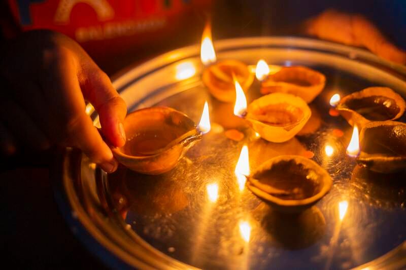 Oil lamps are lit at a home in Dhaka, Bangladesh, to celebrate Diwali. EPA