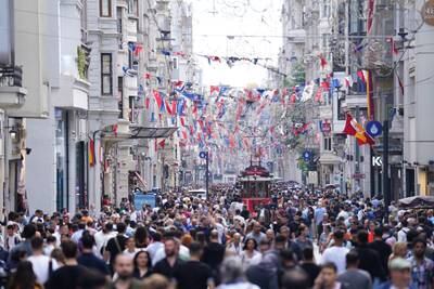 Football fans line the streets in central Istanbul ahead of Saturday's Uefa Champions League Final. PA 