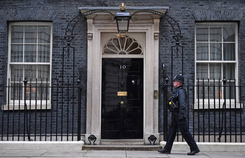 Some argue that there are more doors in the world, such as the famous one on 10 Downing Street, the official residence of Britain's prime minister, in London. AFP