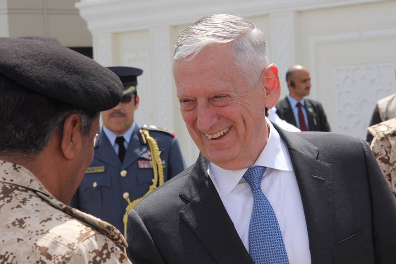 US Defence Secretary Jim Mattis shakes hands with military officials as he departs from Bahrain at Manama airport on March 15, 2018.
Mattis was in Bahrain after a surprise visit to the war-torn capital of Afghanistan two weeks after Afghan President Ashraf Ghani unveiled a plan to open peace talks with the Taliban.  / AFP PHOTO / Thomas WATKINS