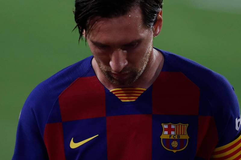 Lionel Messi looks dejected during the Spanish La Liga match between Sevilla and Barcelona at the Ramon Sanchez-Pizjuan stadium in Seville. AP