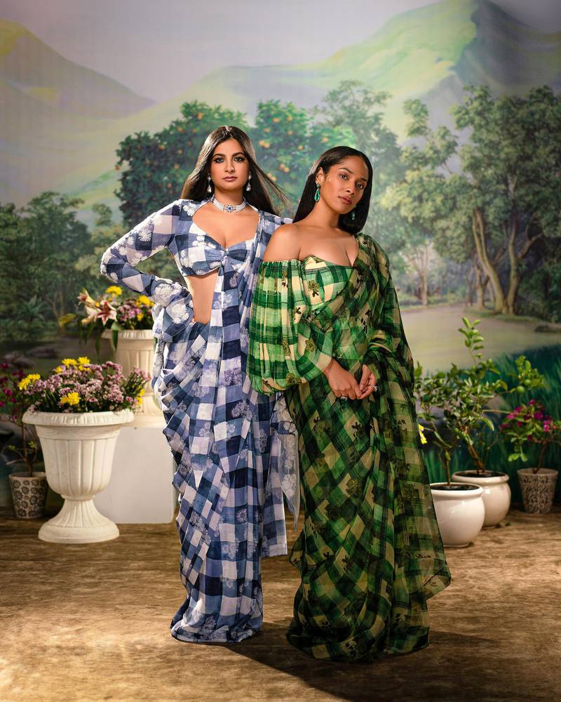 Masaba Gupta and Rhea Kapoor model saris from the Chronicles of Femininity collection, available in Dubai at Vesimi