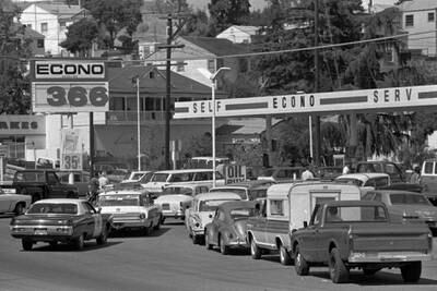 American drivers queue for petrol during the 1973 oil crisis. Mr Carter's term in office came at a time of several energy shocks. AP