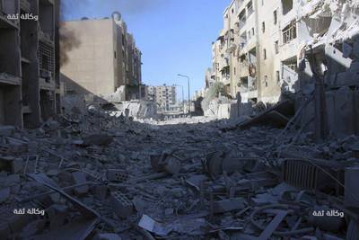 Airstrikes hit the Al-Shaar neighbourhood of Aleppo, Syria, on November 18, 2016, including an area with several hospitals, residents and rescuers said. Thiqa News via AP 