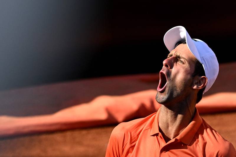Novak Djokovic celebrates winning a game during the final. AFP
