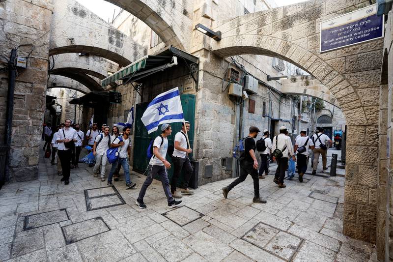 Israel flags are paraded through Jerusalem's Old City. Reuters