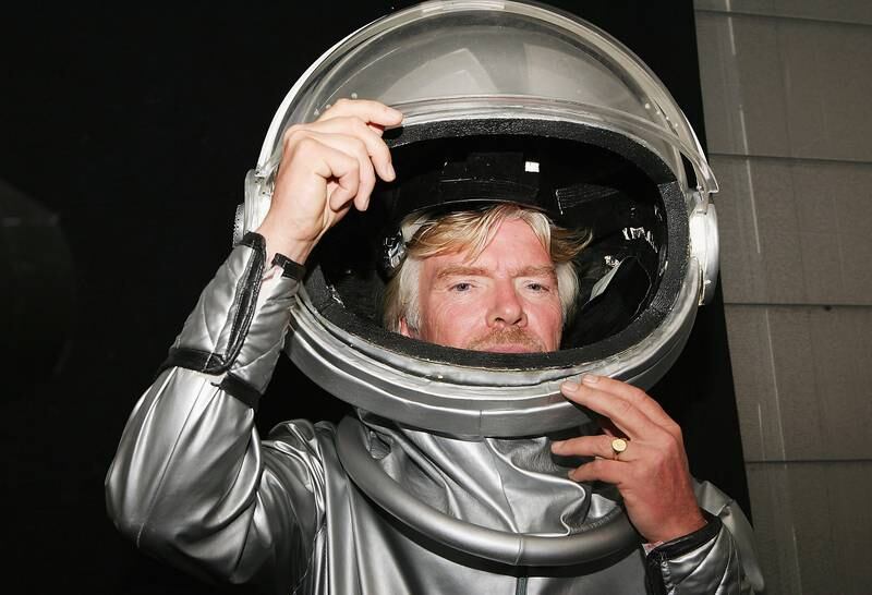 Sir Richard Branson signing up to become an astronaut in Sydney in 2005.