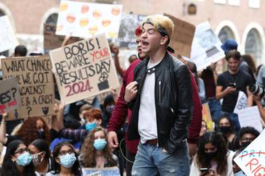 People take part in a protest outside the Department for Education, London, on August 16, 2020, in response to the A-level results. AP