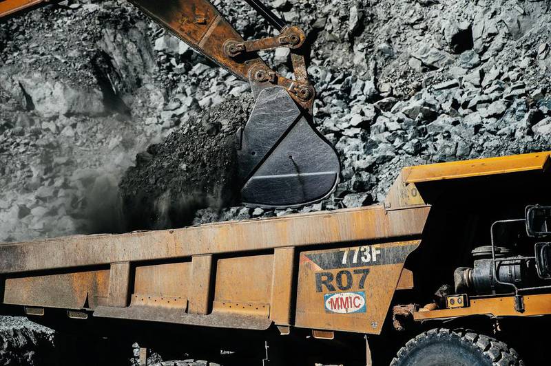 A digger dumps diamond bearing rock ore, also known as kimberlite, into a truck for removal to the processing plant at the Letseng diamond mine. Waldo Swiegers / Bloomberg