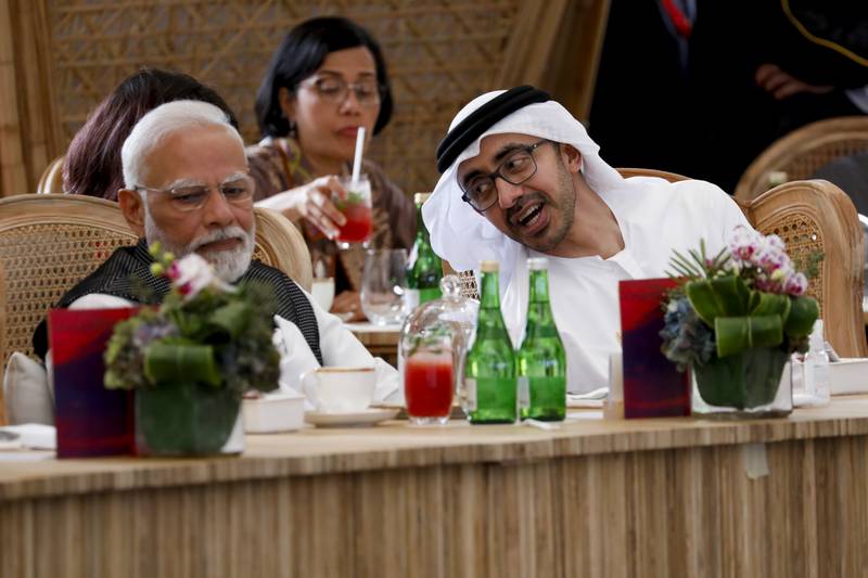 Sheikh Abdullah bin Zayed, Minister of Foreign Affairs and International Co-operation, talks to Indian Prime Minister Narendra Modi at a leaders' lunch. AP