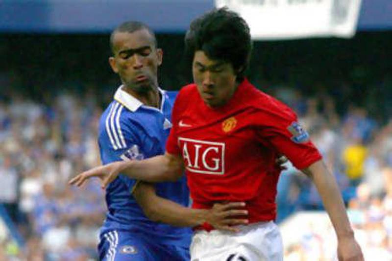 Chelsea's Jose Bosingwa, left, tackles Manchester United's goalscorer Ji-Sung Park during their 1-1 draw at Stamford Bridge.