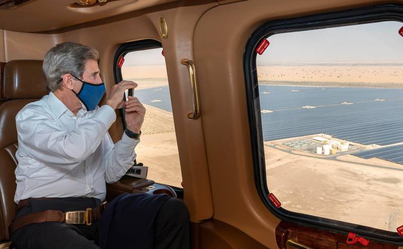 US Special Presidential Envoy for Climate John Kerry looks at Noor Abu Dhabi solar plant in Abu Dhabi, United Arab Emirates April 3, 2021. XXX