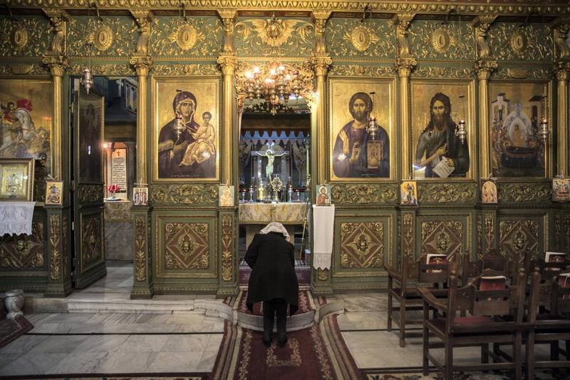 Members of Gaza's Greek Orthodox Christian community as they arrive for Sunday mass at the Church of Saint Porphyrius in Gaza City on December 23,2018. (Photo by Heidi Levine for The National).