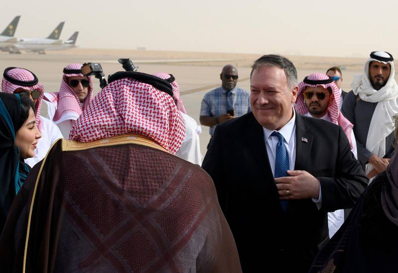 US Secretary of State Mike Pompeo, right, is met by a member of Saudi protocol as he arrives in Riyadh.  AP