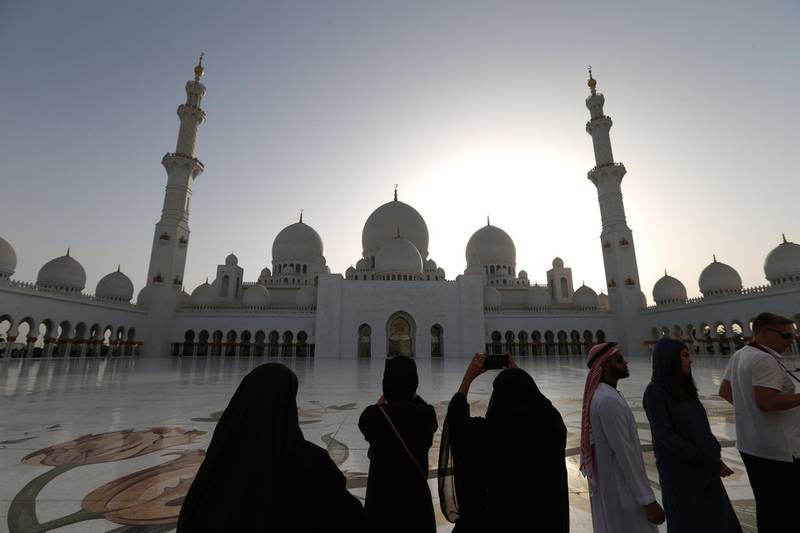 epa06685163 People visit the Sheikh Zayed Mosque in Abu Dhabi, United Arab Emirates, 22 April 2018. The Sheikh Zayed Grand Mosque is considered the largest mosque in the UAE and the sixth largest in the world. It is named after the late Sheikh Zayed bin Sultan Al Nahyan (1918-2004), the UAE's first president, who is also buried there, and visited daily by tourists and local residents alike.  EPA/ALI HAIDER