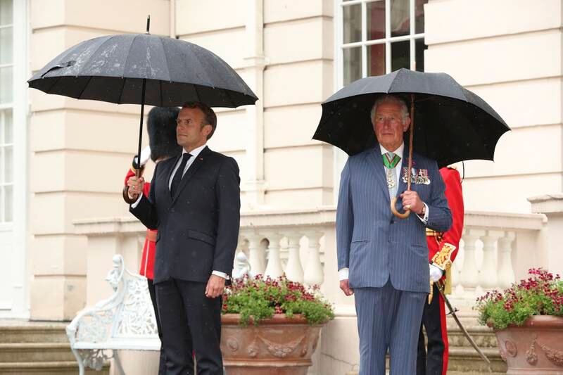 Then Prince Charles welcomes French President Emmanuel Macron to London in 2020. King Charles' visit to France has been postponed. AP Photo