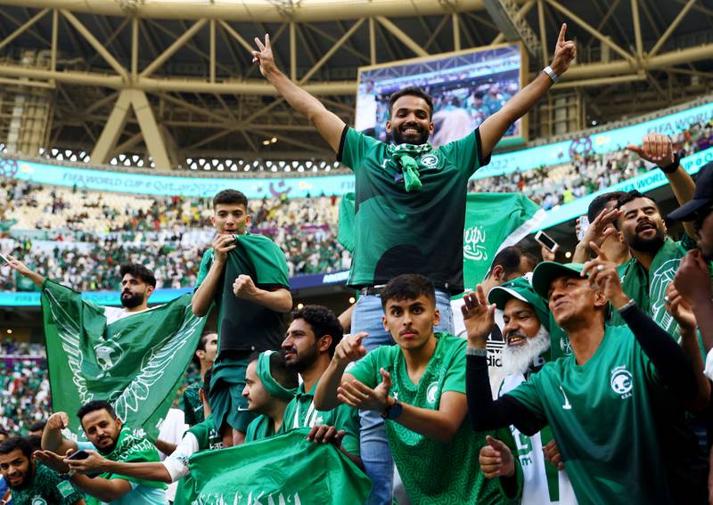 Saudi fans celebrate after their national team beat Argentina 2-1 in the World Cup at the Lusail Stadium in Qatar. Reuters