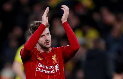 Liverpool's Adam Lallana looks dejected as he applauds fans at the end of the defeat to Watford in February. Reuters