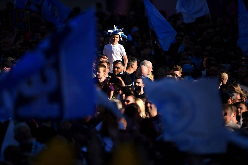 Fans look on during the Manchester City Teams Celebration Parade  in Manchester, England. Getty Images