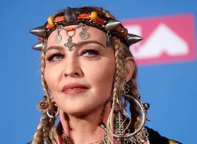 2018 MTV Video Music Awards - Photo Room - Radio City Music Hall, New York, U.S., August 20, 2018. - Madonna poses backstage. REUTERS/Carlo Allegri