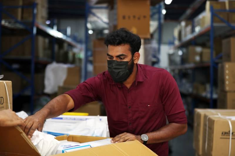 Sri Lankan residents in Dubai, India and the UK hold daily video meetings with government officials in Colombo, where the medical needs are detailed. Expatriates then organise supplies and send the shipments home. Chris Whiteoak / The National 