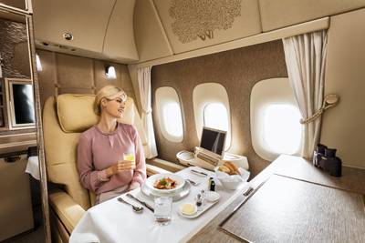 Dining in first class. Courtesy Emirates