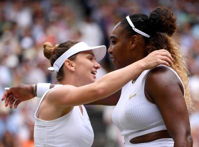 Simona Halep and Serena Williams embrace at the end of their match. EPA