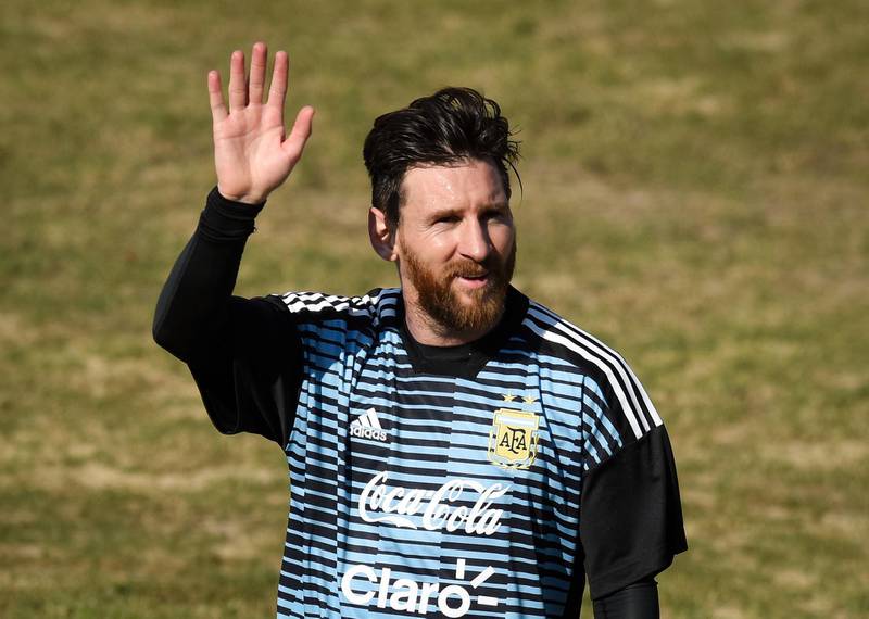 BUENOS AIRES, ARGENTINA - MAY 27: Lionel Messi greets the fans during a training session open to the public as part of the team preparation for FIFA World Cup Russia 2018 at Tomas Adolfo Duco Stadium on May 27, 2018 in Buenos Aires, Argentina.  (Photo by Marcelo Endelli/Getty Images)
