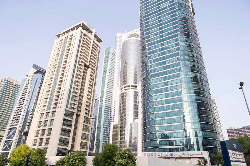 DUBAI, UNITED ARAB EMIRATES, 15 JULY 2015. Apartment buildings on Sheikh Zayed Road in the JLT (Jumeirah Lakes Towers) neighbourhood of Dubai. Property, Rents, Apartments, Rental, Tower, Skyscraper. (Photo: Antonie Robertson/The National) Journalist: Stock. Section: Business. *** Local Caption ***  AR_1607_Apartment_Stock-26.JPG