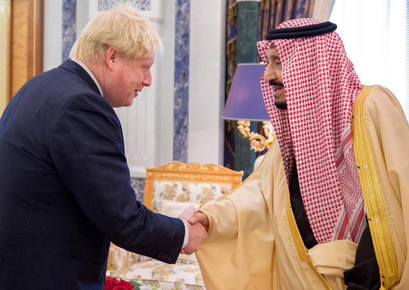 Saudi King Salman Bin Abdulaziz Al-Saud shaking hands with British foreign secretary Boris Johnson in Riyadh, Saudi Arabia, 11 December 2016. Saudi Press Agency handout via EPA