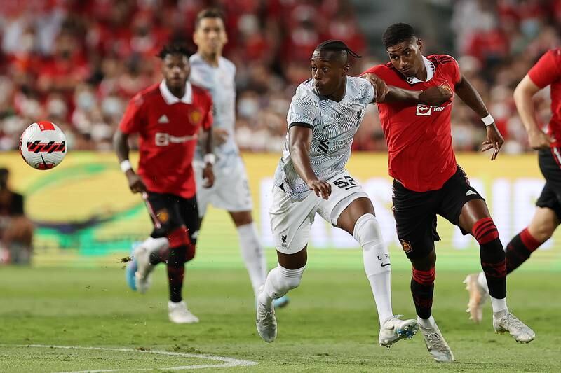 Isaac Mabaya of Liverpool competes with Marcus Rashford of Manchester United. Getty 