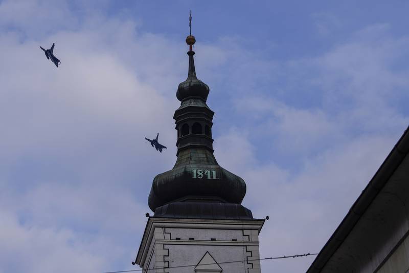Fighter jets fly past a church in Croatia. AFP